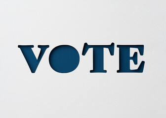 Vote Letters Cut Out On White Paper