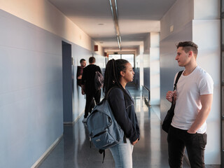 Group of students talking in hall