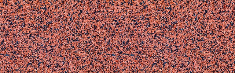 Panorama of Red rubber running track flooring texture and seamless background