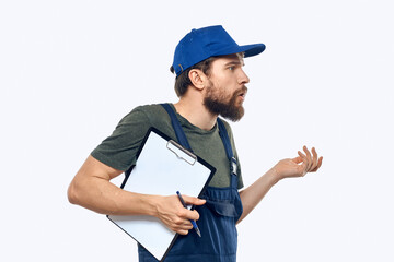 man in working uniform documents delivery loader transportation light background