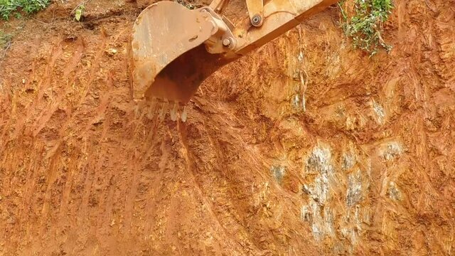 closeup of a earth mover (JCB) vehicle working on the earth surface