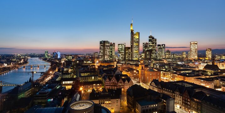 Frankfurt skyline at dusk, with buildings of Commerzbank, Hessische Landesbank, Deutsche Bank, European Central Bank, ECB, Skyper, Sparkasse, DZ Bank, Frankfurt am Main, Hesse. Germany, Europe