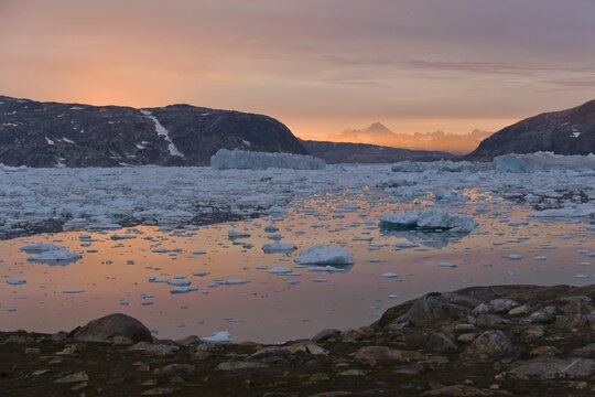 Midnight sun, ice and icebergs, Johan Petersen Fjord, East Greenland, Greenland, North America