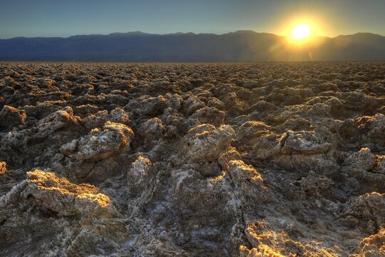 Salt crusts on the Devil's Golf Course, sunset, dusk, Panamint Range, Black Mountains, Death Valley National Park, Mojave Desert, California, USA, North America
