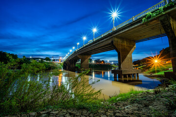 The color of Night traffic light on the road on the bridge (Eka Thot Sa Root Bridge) in Phitsanulok, Thailand.