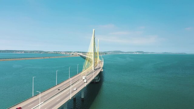 Beautiful aerial shot along Anita Garibaldi bridge above the ocean, located in Laguna, Santa Catarina, Brazil