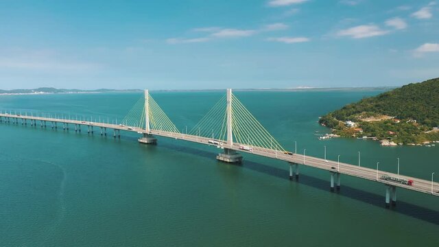 Amazing panoramic aerial shot Anita Garibaldi bridge above the turquoise color ocean, located in Laguna, Santa Catarina, Brazil