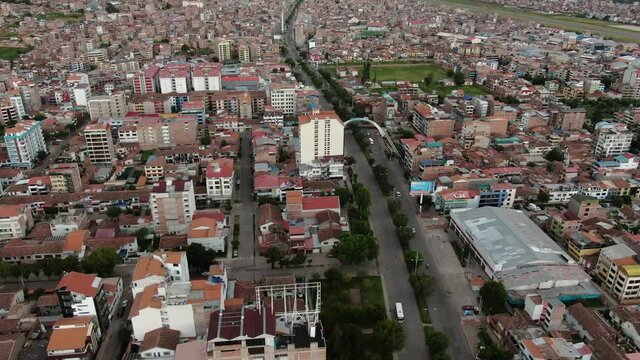 4k daytime panoramic aerial drone footage over Avenida de la Cultura boulevard in Cusco, Peru during Coronavirus lockdown. Dolly in wide angle shot.