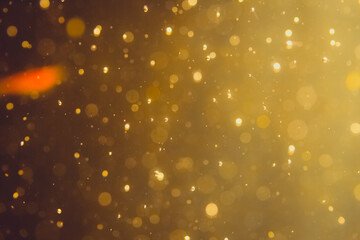 Dark Abstract Gold bokeh sparkle on black