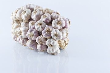 Bundle of garlic isolated on white backgrond.