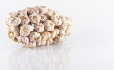 Bundle of garlic isolated on white backgrond.