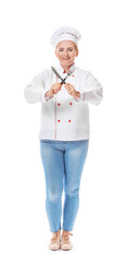 Mature female chef on white background