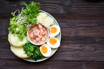 Fresh Boiled Shrimp paste sauce with vegetables in plate