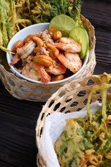 Crispy deep fried morning glory with spicy shrimp salad.