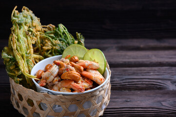 Crispy deep fried morning glory with spicy shrimp salad.
