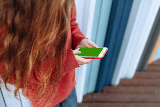 Teenager girl playing in smartphone