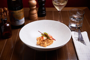 Risotto with lobster dish in a high cuisine restaurant