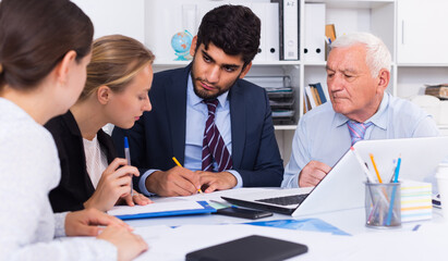 Fototapeta premium Employees are writing financial reports in the office.
