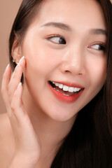 Fototapeta premium Asian beauty woman with natural makeup, cosmetic and plastic surgery concept, Isolated mocha brown background