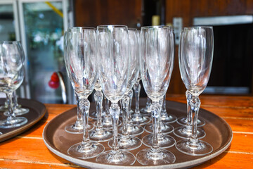 Champagne glass stand on the table - Empty glass of champagne or Wine glass