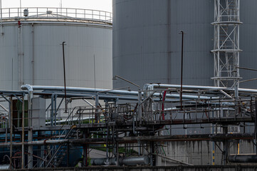 close-up of fuel tanks and pipeline in the fuel warehouse. Industrial scene.