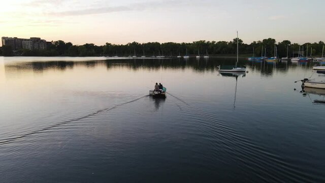 Two People On A Boat At Lake Bde Maka Ska, Minneapolis Minnesota