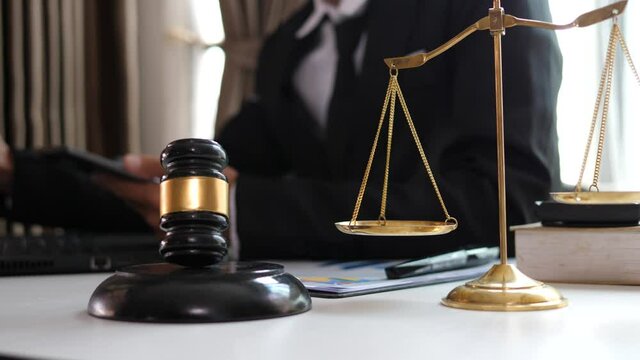 Male lawyer or judge consult having team meeting with client, Law and Legal services concept