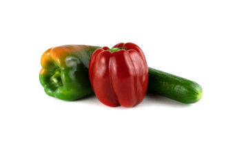 Two red peppers and a cucumber
