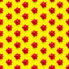 Seamless regular creative Christmas pattern with New Year decorations. xmas Modern Seamless pattern made from christmas decorations. yellow background