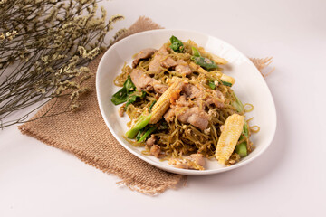 Fried jade noodles with soy sauce and pork