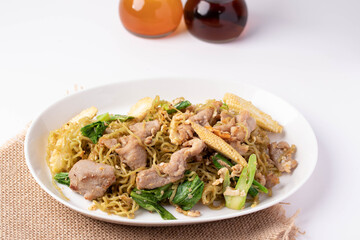 Fried jade noodles with soy sauce and pork