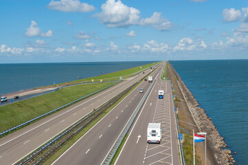 Afsluitdijk dam in Holland (Netherlands). Dam road
