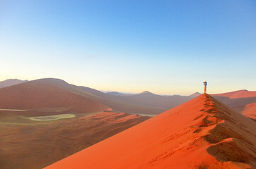 Beautiful sunrise dunes, african landscape of Namib desert, Sossusvlei, Namibia, South Africa
