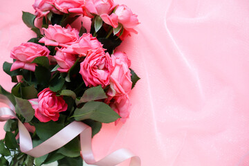 romantic composition of pink flowers on a pink background