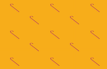 Orange Christmas background. Red seamless pattern. Candy cane decor. New Year party symbol design. Peppermint lollipop minimalist arrangement isolated on bright yellow.