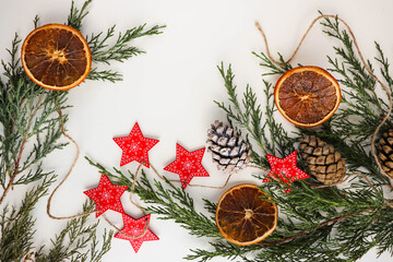 mock up christmas card. christmas composition of fir branch and tree decorations on white background
