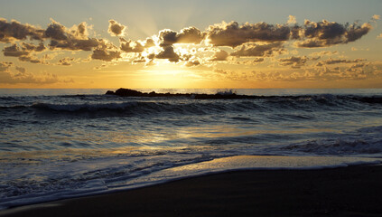 Fototapeta na wymiar clouds and sunset on the sea