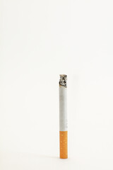 One cigarette with ash and smoke