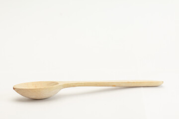 wooden spoon on white background