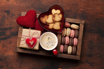Valentines day card with gift, cookies and coffee cup