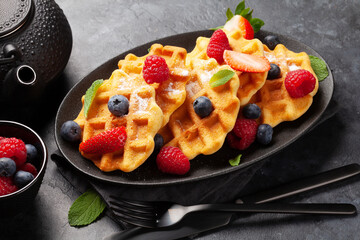 Delicious belgian waffles with summer berries