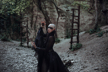 Beautiful young bald woman portrait outdoors. spiritual concept.