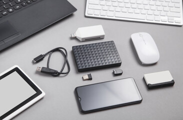 Modern digital devices for the transfer and storage of information.