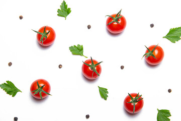 Cherry tomatoes on a white background . Background vegetables. Copy space. Small tomatoes. Article about tomatoes. decoration