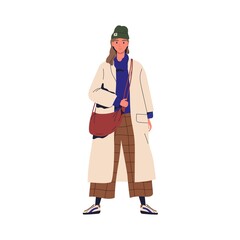 Young stylish woman demonstrating trendy outwear. Female character in fashionable autumn outfit. Cheerful woman wearing oversize coat. Flat vector cartoon illustration isolated on white