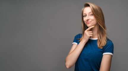 Photo of attractive female making up plan in mind, wanting to do something secretly. Facial expression concept