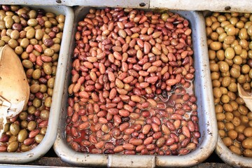Stall with Kalamata or Kalamon olives at street market in Athens, Greece.