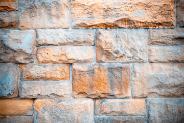 Wall background. Old rough stone on cement pattern wall background. Vintage grunge plaster or concrete stucco surface. Art rough stylized texture banner with space for text.