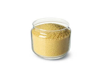 Glass jar with couscous isolated on white background