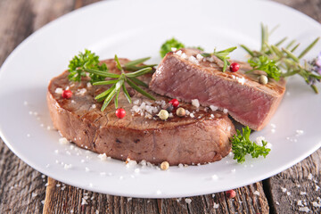 beefsteak with pepper, salt and herbs